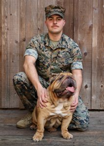 Marine Willett with his bulldog Osiris
