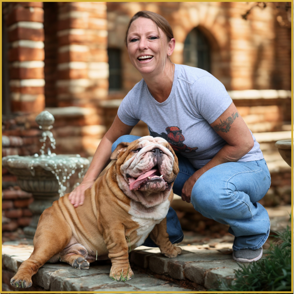 Nicole Willett, ethical English Bulldog breeder in Florida, with Zeus, one of the foundation dogs of Bullgodz English Bulldogs